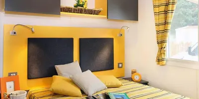 Letto o letti in una camera di Camping villaggio L'Ultima spiaggia
