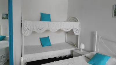 Letto o letti in una camera di Appartamenti in Villa Nicanda