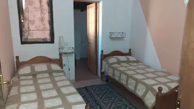 Letto o letti in una camera di Agriturismo S'Armidda
