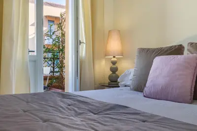 Letto o letti in una camera di BB22 Cagliari