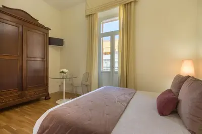 Letto o letti in una camera di BB22 Cagliari