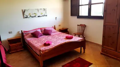 Letto o letti in una camera di Su Sattisceddu