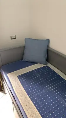 Letto o letti in una camera di Villino Mimosa
