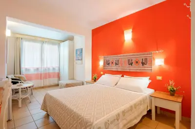 Letto o letti in una camera di Il Piccolo Giardino rooms & breakfast