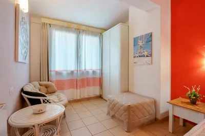 Area soggiorno di Il Piccolo Giardino rooms & breakfast