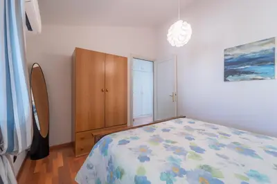 Letto o letti in una camera di Margherita Holiday House