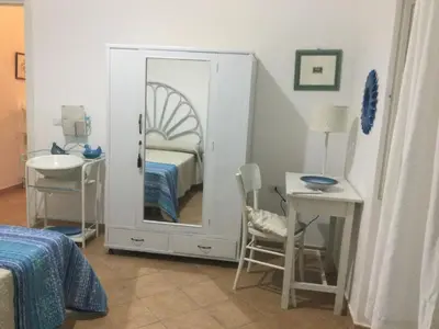 Letto o letti in una camera di Domo Mea