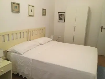 Letto o letti in una camera di Domo Mea