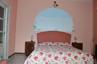Letto o letti in una camera di Sa Domu de sa Contissa