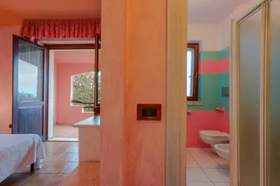 Letto o letti in una camera di Hotel I Ginepri