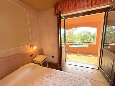 Letto o letti in una camera di Hotel I Ginepri