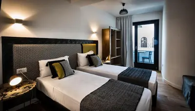 Letto o letti in una camera di Teku Sardinia Boutique Hotel