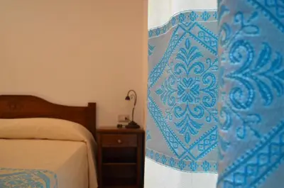 Letto o letti in una camera di Casa Vacanze La Pavoncella