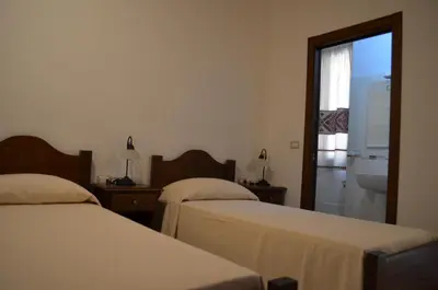 Letto o letti in una camera di Casa Vacanze La Pavoncella