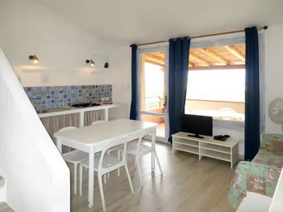 Area soggiorno di Holiday Home Residence Delphino - REI250 by Interhome