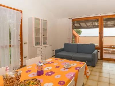 Area soggiorno di Holiday Home Residence Delphino - REI250 by Interhome
