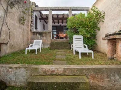 Giardino di Holiday Home Residence Delphino - REI255 by Interhome