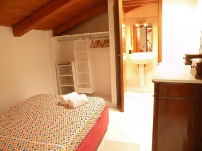 Letto o letti in una camera di Deliziosa mansarda nel quartiere Marina - Cagliari Q8577