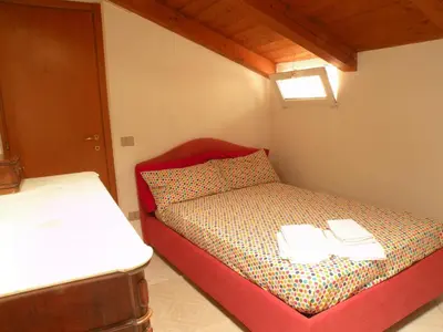 Letto o letti in una camera di Deliziosa mansarda nel quartiere Marina - Cagliari Q8577