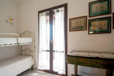 Letto o letti in una camera di Rosa Holiday Home