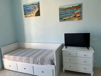 Letto o letti in una camera di Casa Tacconi