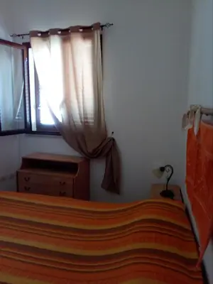 Letto o letti in una camera di la casa della capretta