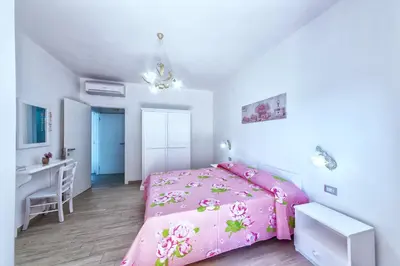 Letto o letti in una camera di Isola Antica