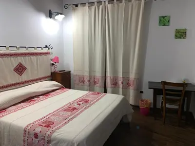 Letto o letti in una camera di Antica Potecarìa