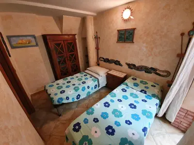 Letto o letti in una camera di Casa Sole