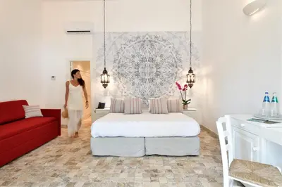 Letto o letti in una camera di Arbatax Park Resort - Cottage