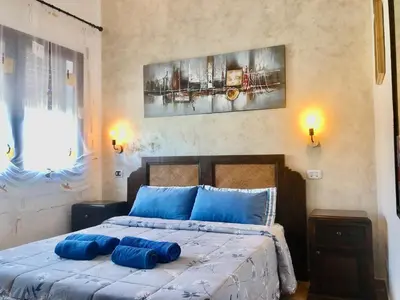 Letto o letti in una camera di Casa Bea B&B