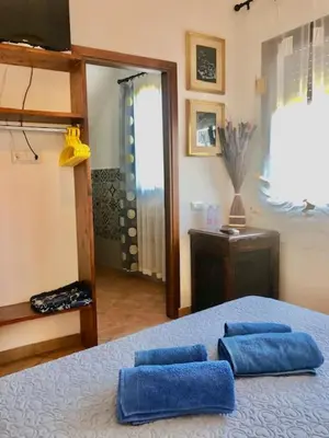 Letto o letti in una camera di Casa Bea B&B