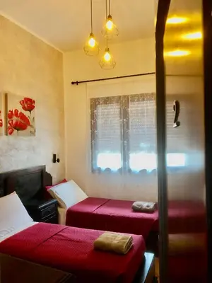 Letto o letti in una camera di Casa Bea B&B