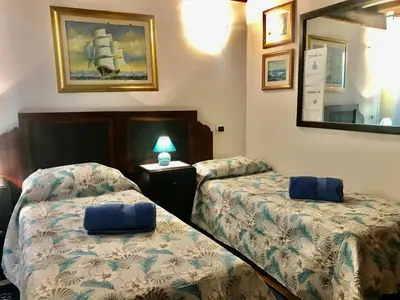 Letto o letti in una camera di Casa Bea B&B