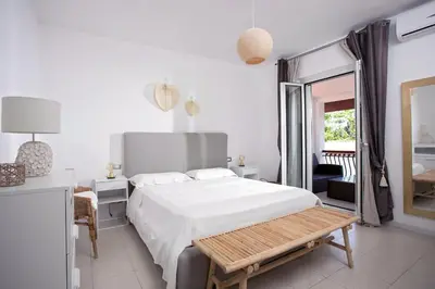 Letto o letti in una camera di Villa Elisabetta Apartments