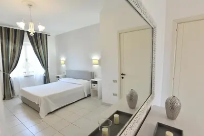 Letto o letti in una camera di Villa Elisabetta Apartments