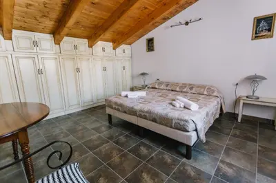 Letto o letti in una camera di Villa Riviera