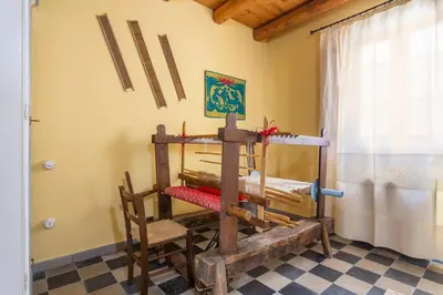 Letto o letti in una camera di Antica dimora dell'Arcolaio