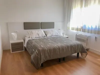 Letto o letti in una camera di Four Rooms Guesthouse