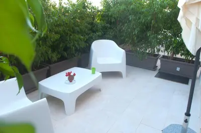 Area soggiorno di Four Rooms Guesthouse
