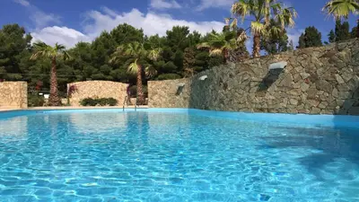 Piscina di RESIDENCE ELEGANCE ville ed appartamenti a Porto Pino o nelle vicinanze
