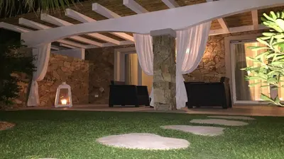 Giardino di RESIDENCE ELEGANCE ville ed appartamenti a Porto Pino