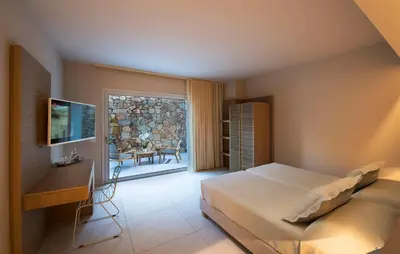 TV o dispositivi per l'intrattenimento presso Domu Simius Life Style Hotel