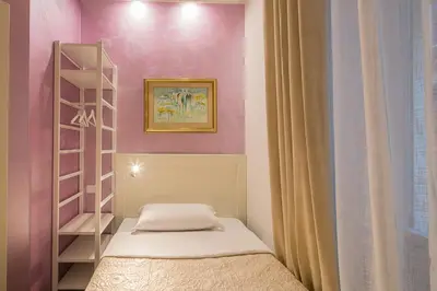 Letto o letti in una camera di Vela Rooms