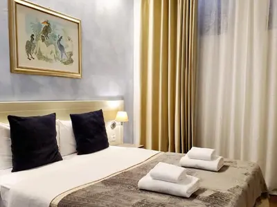 Letto o letti in una camera di Vela Rooms