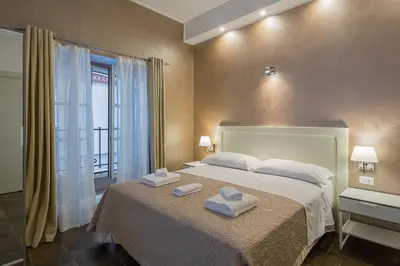 Letto o letti in una camera di Vela Rooms