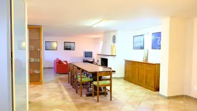 TV o dispositivi per l'intrattenimento presso La Baia Casa vacanze-Seminterrato