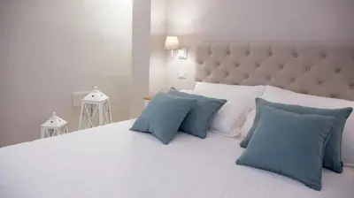 Letto o letti in una camera di Le Saline Suites