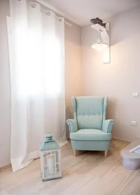 Area soggiorno di Le Saline Suites