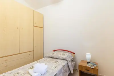 Letto o letti in una camera di Casa a due passi dal mare